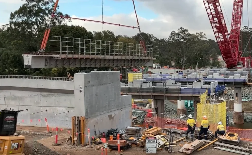 Concrete girder resting on new bridge supports